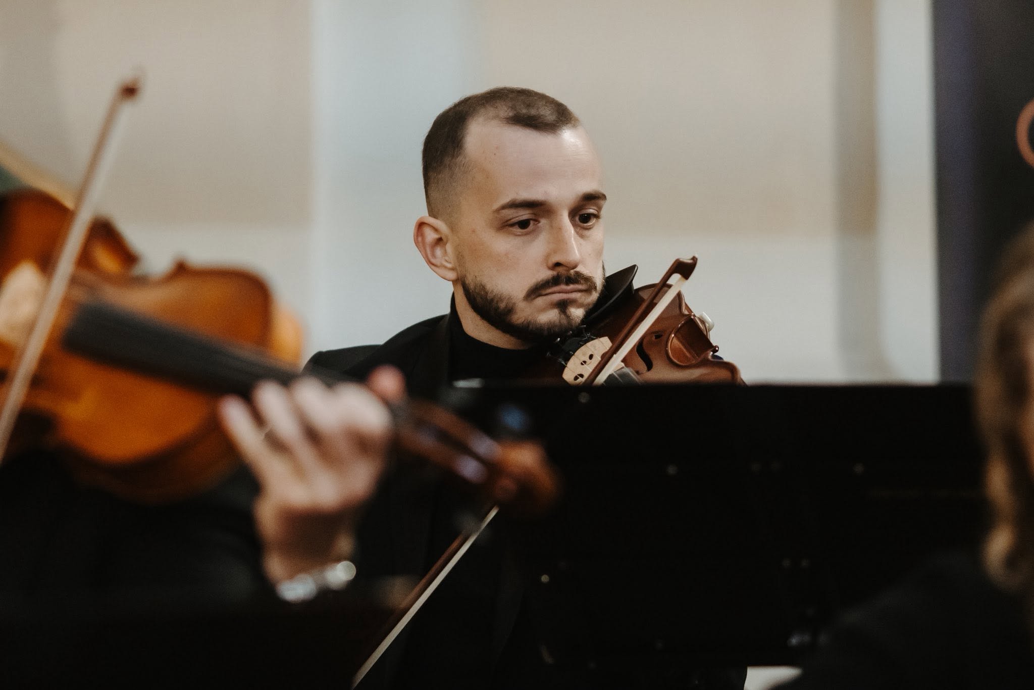 Peter Dombrovský playing viola with Edevart Orchestra